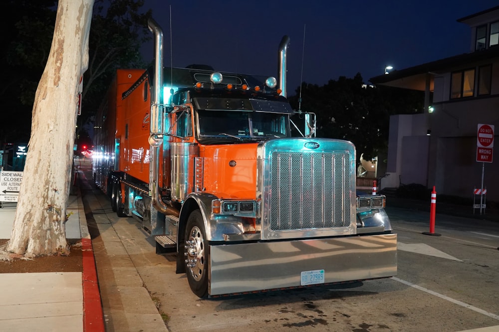 a semi truck parked on the side of the road