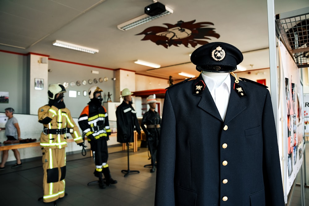 a fireman's uniform is on display in a room
