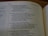 An open book displaying a passage from the Old Testament with text that discusses prayer, grief, and lamentation. The book is laid flat, and the focus is on the content, highlighting verses with emotional and religious themes.