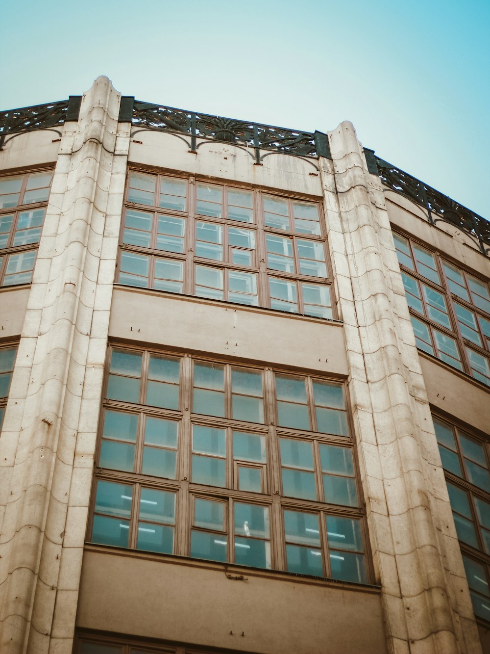 a tall building with lots of windows on top of it