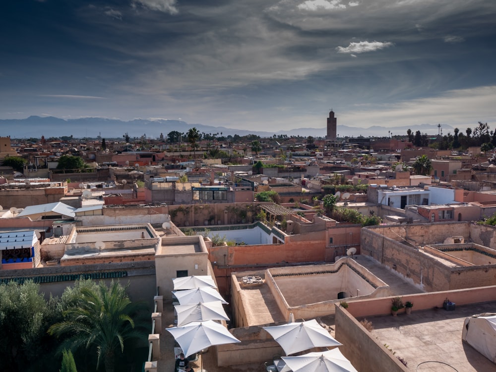 a view of a city with a clock tower in the distance