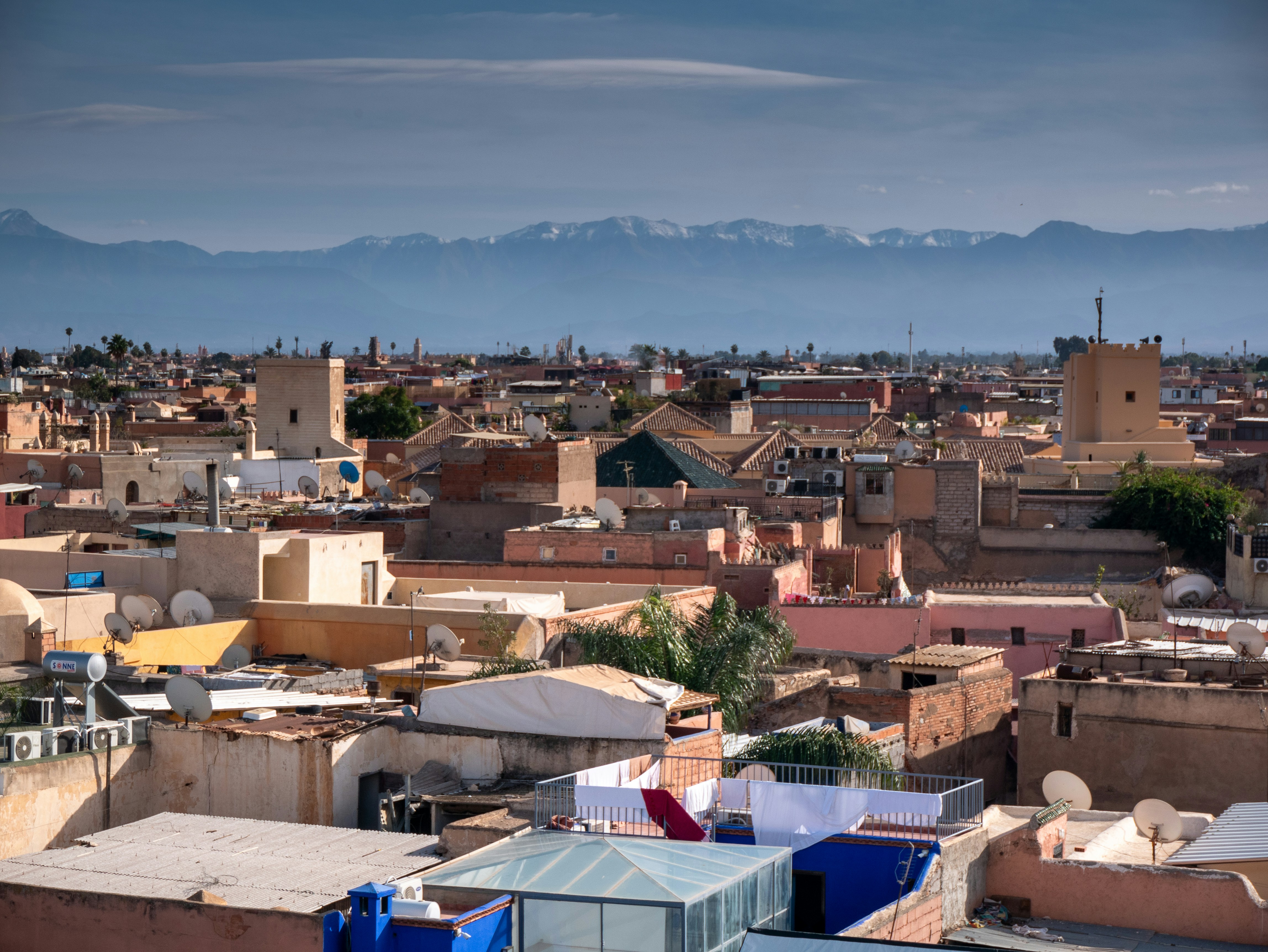 A view of a city with mountains in the background