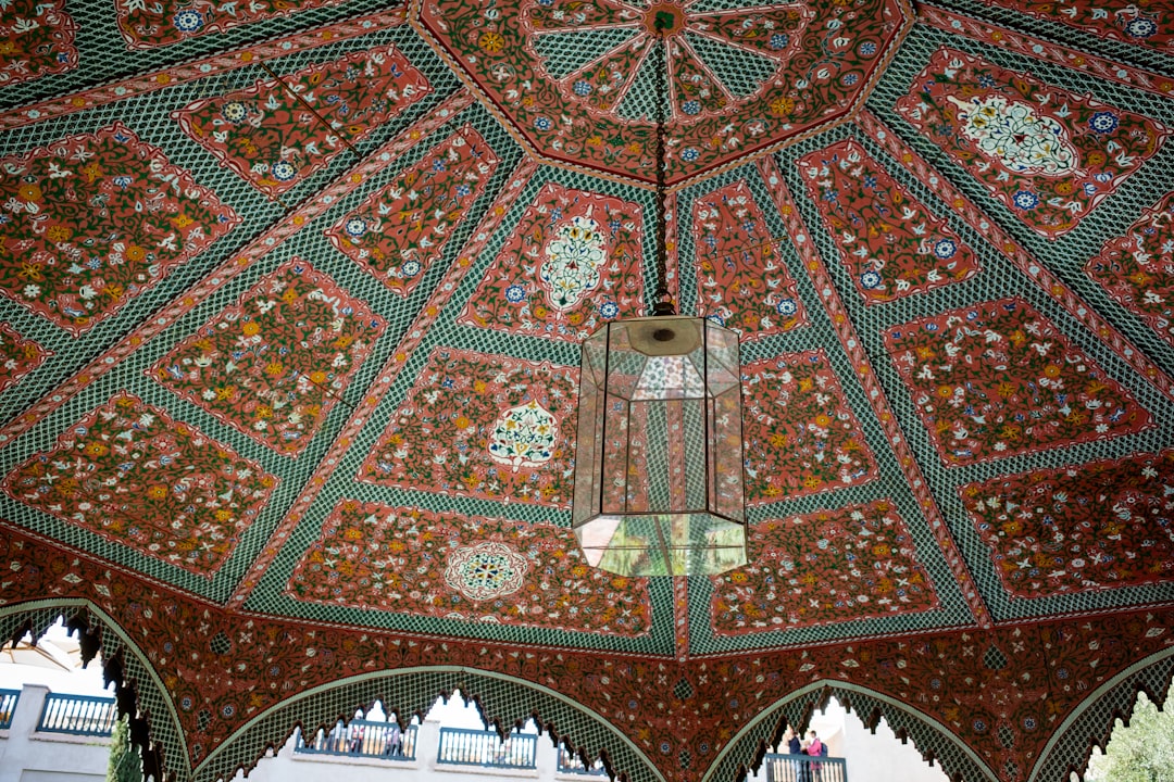 a colorfully decorated ceiling in a building,