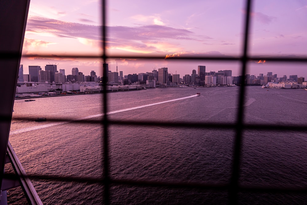 a view of a body of water with a city in the background