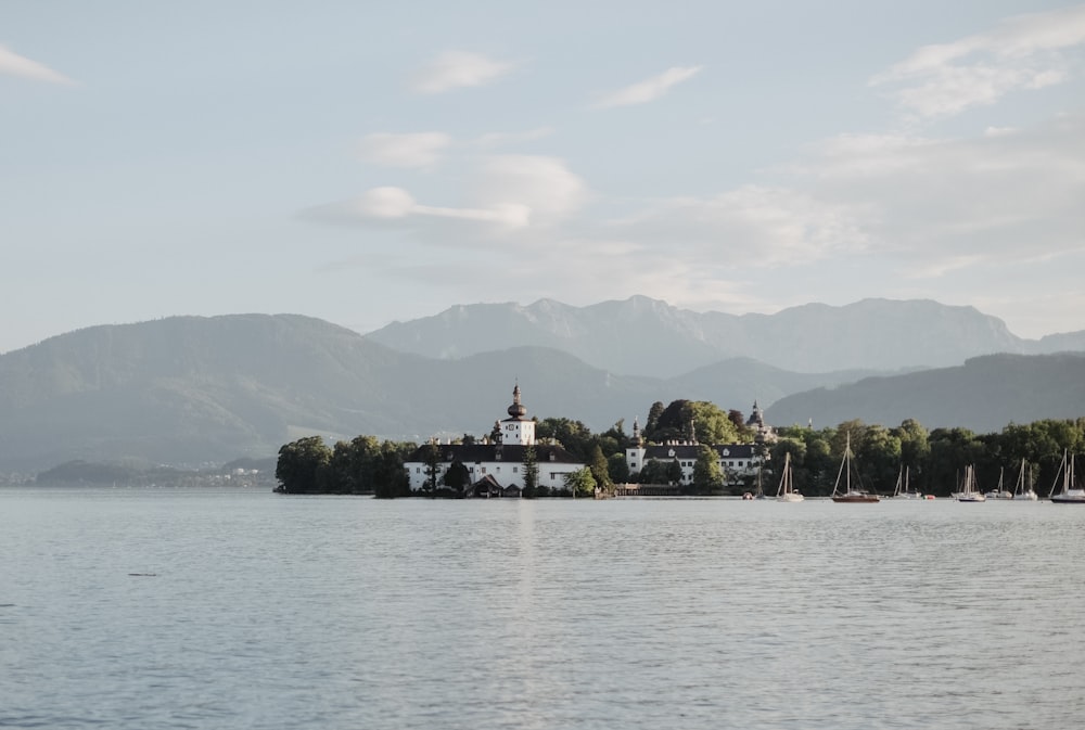 a large body of water with a small island in the middle of it