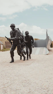 a group of men in military uniforms running
