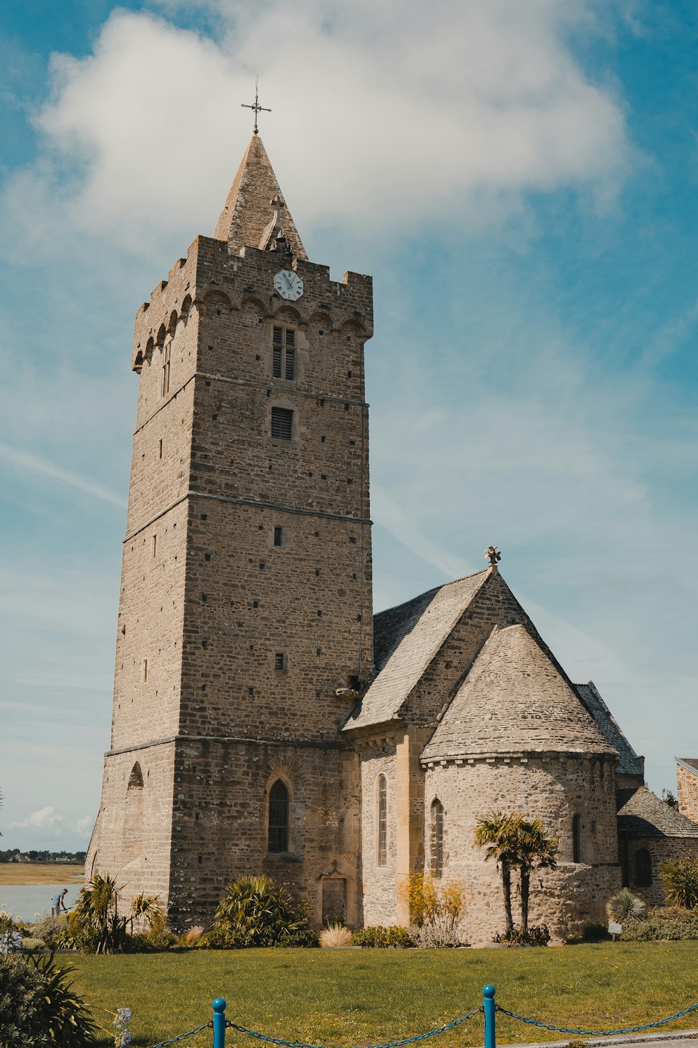 a tall tower with a clock on the top of it