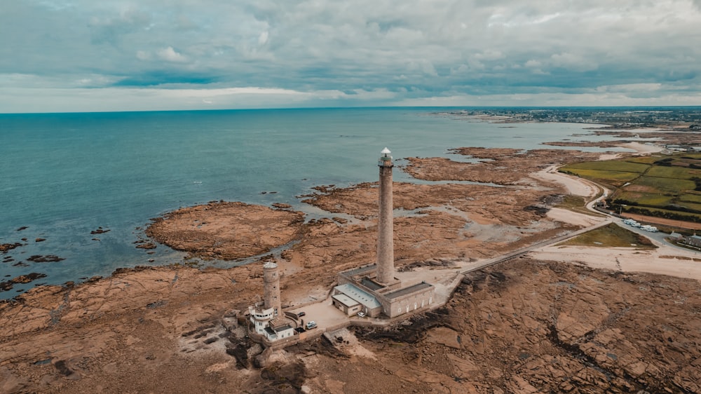 an aerial view of a power plant near the ocean