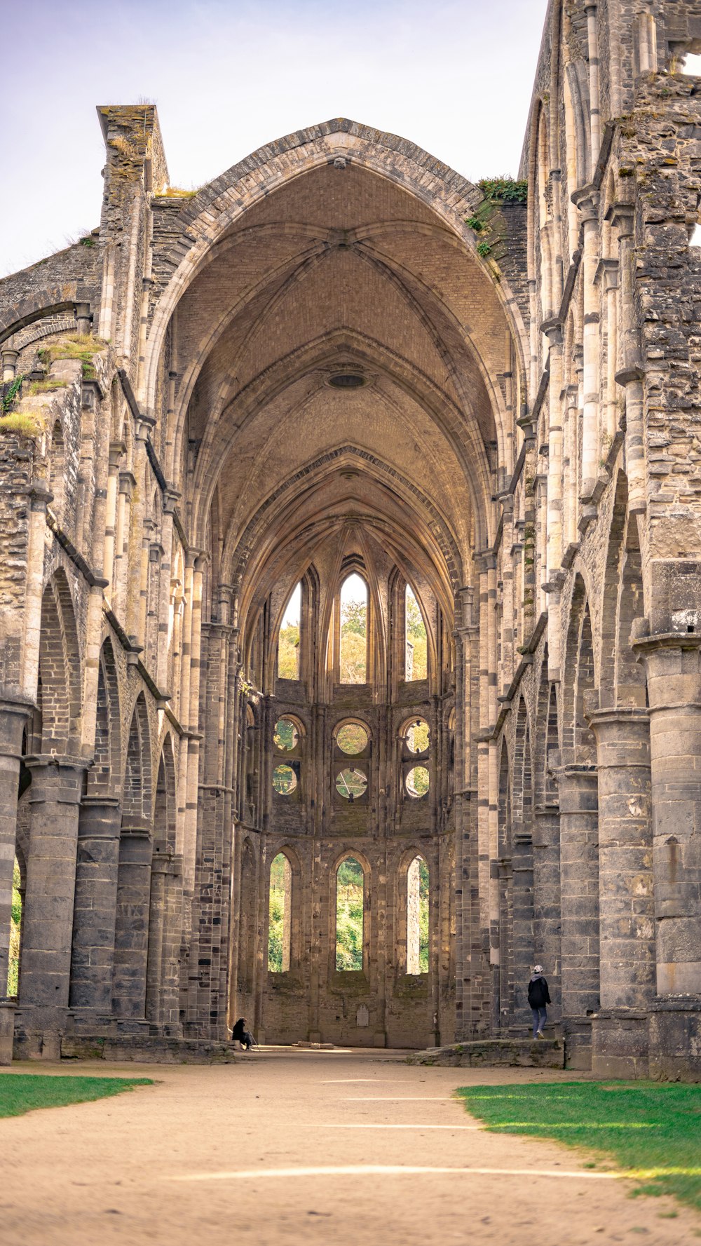 a large stone building with many windows and arches