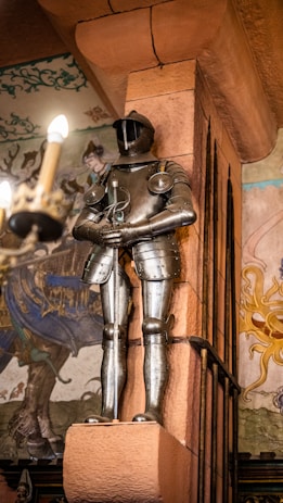 a statue of a man in a suit of armor