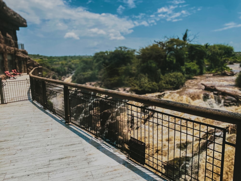 a man riding a skateboard down a metal railing