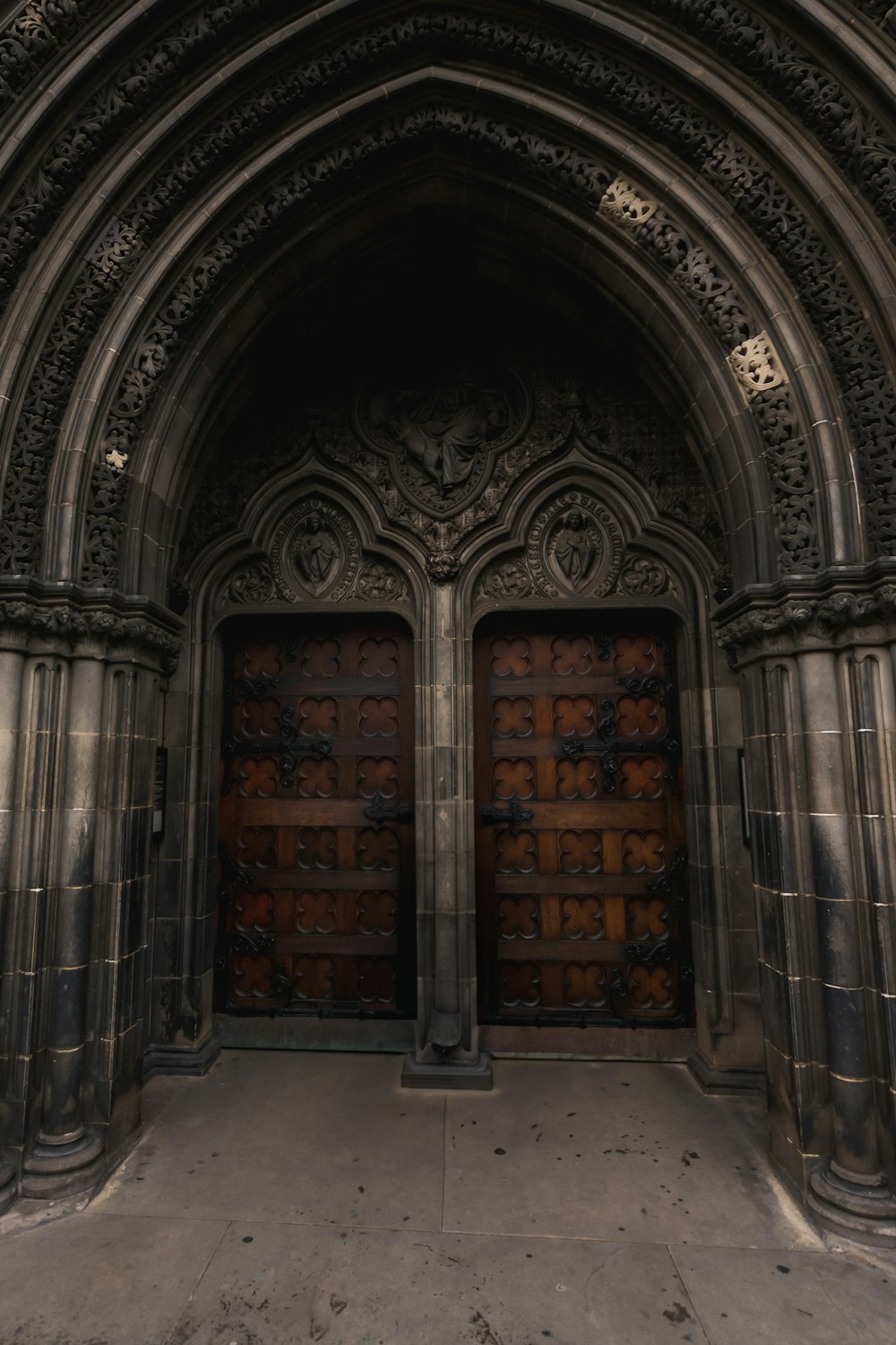 a very large building with a big wooden door