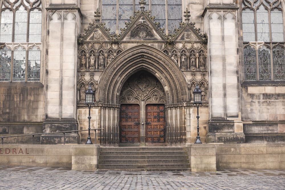 a large stone building with a wooden door