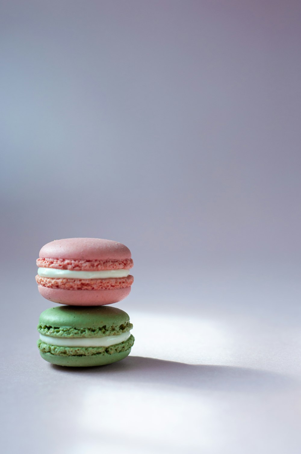 a stack of three macaroons sitting on top of each other