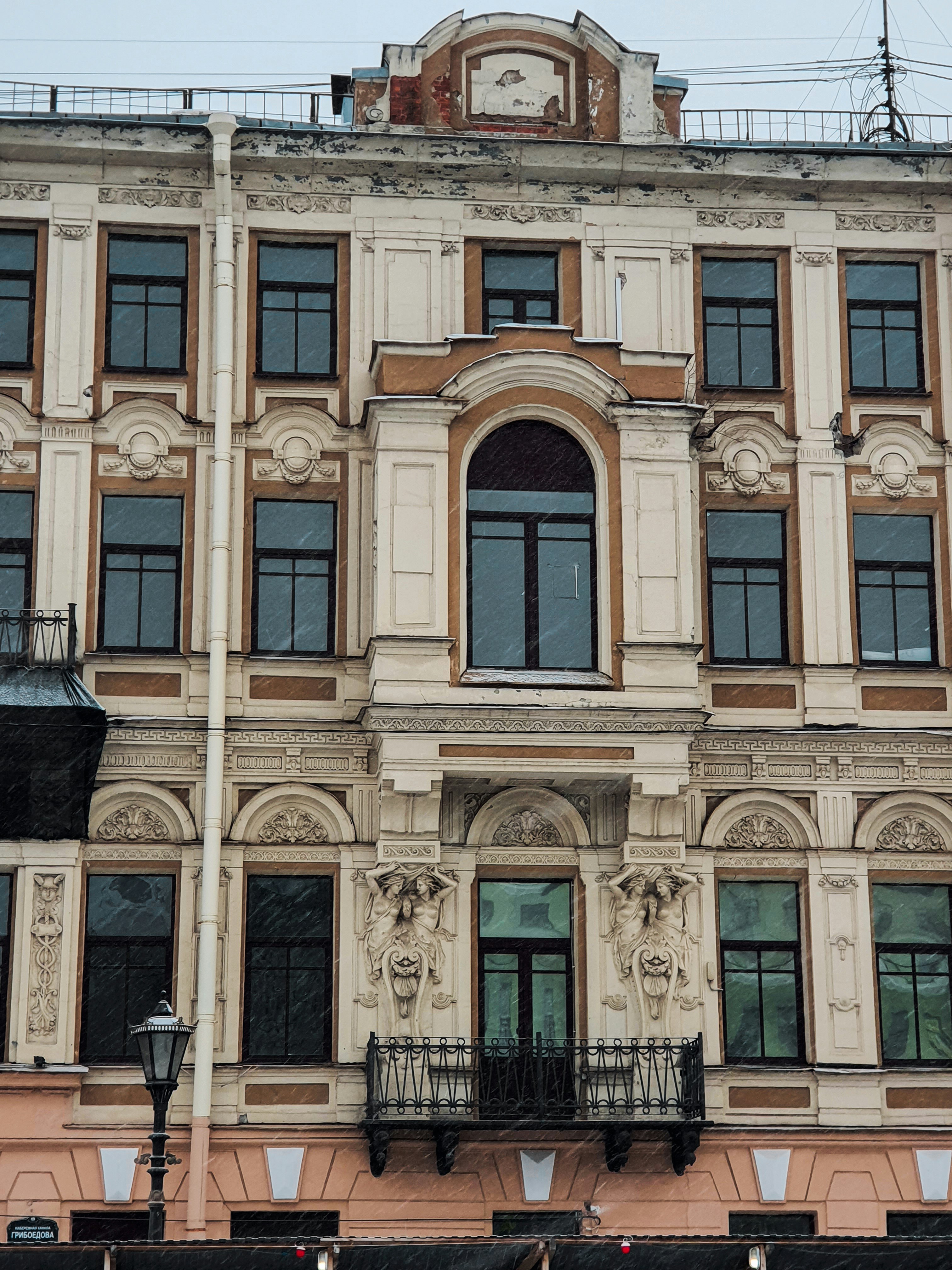a tall building with a clock on the top of it