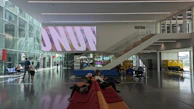 A newly renovated community center with residents enjoying the space.