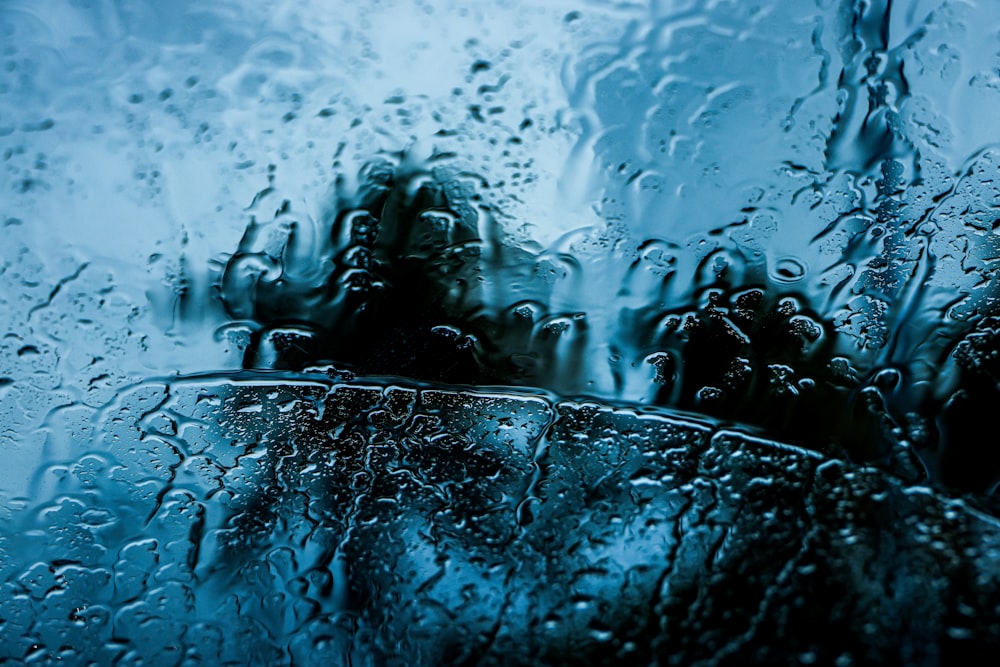 rain drops on the window of a car