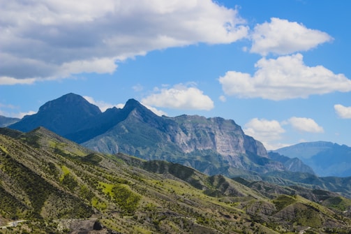 A picturesque mountain view with lush greenery.