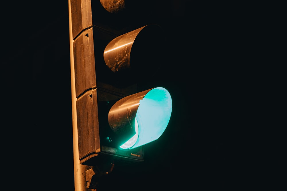 a traffic light with a green light on it