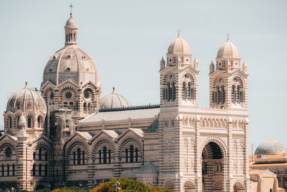 a large building with two towers on top of it