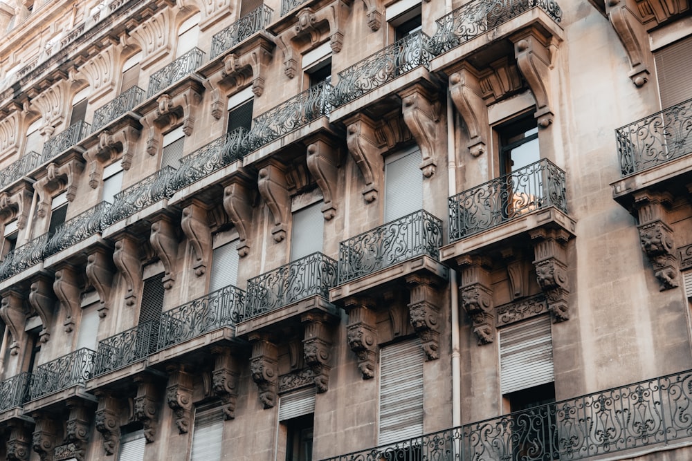 a tall building with ornate balconies and balconies