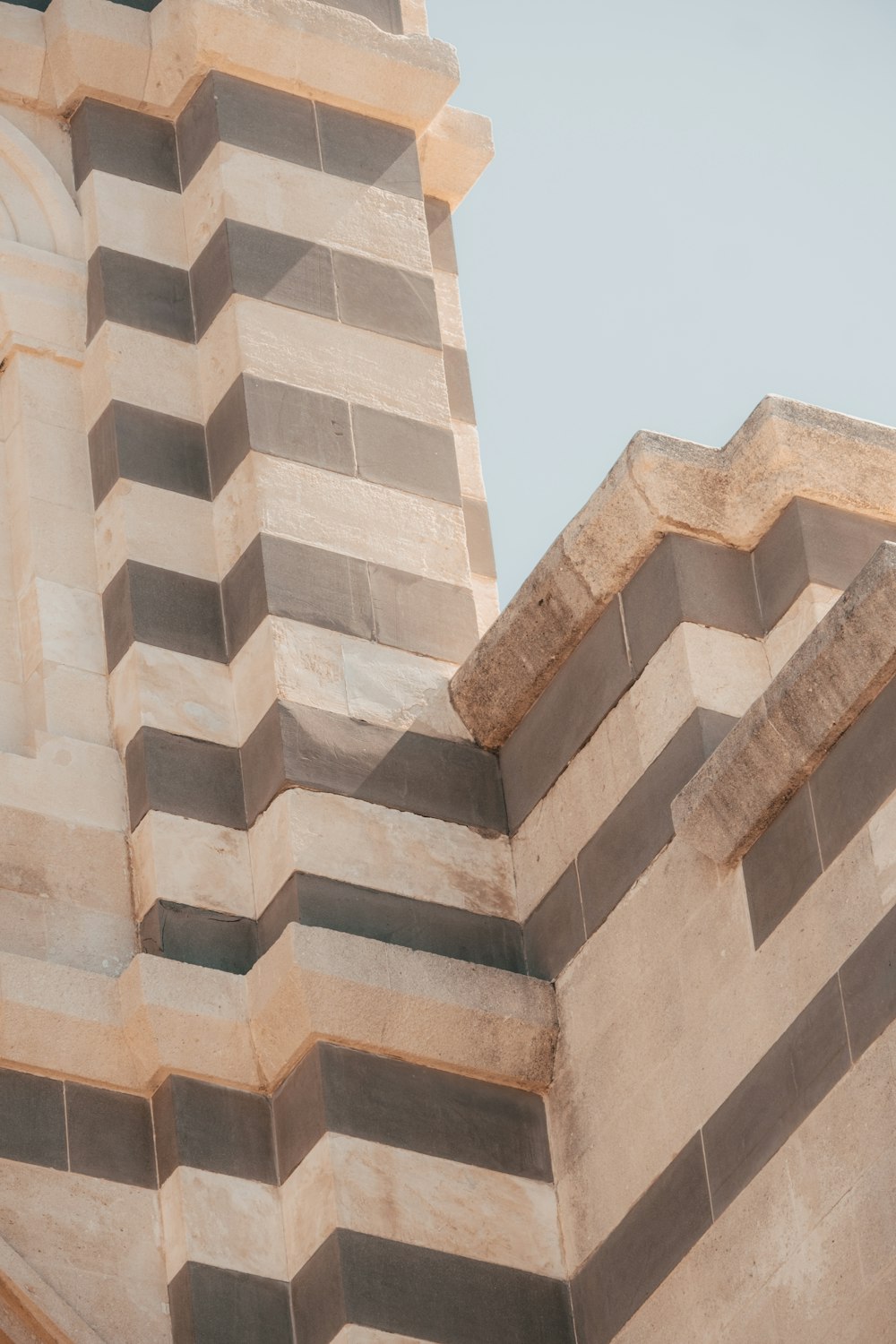 a tall building with a clock on the side of it