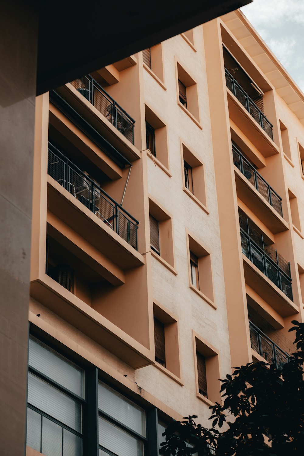 a tall building with balconies and balconies on it