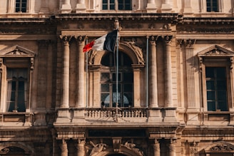 a large building with a flag on top of it