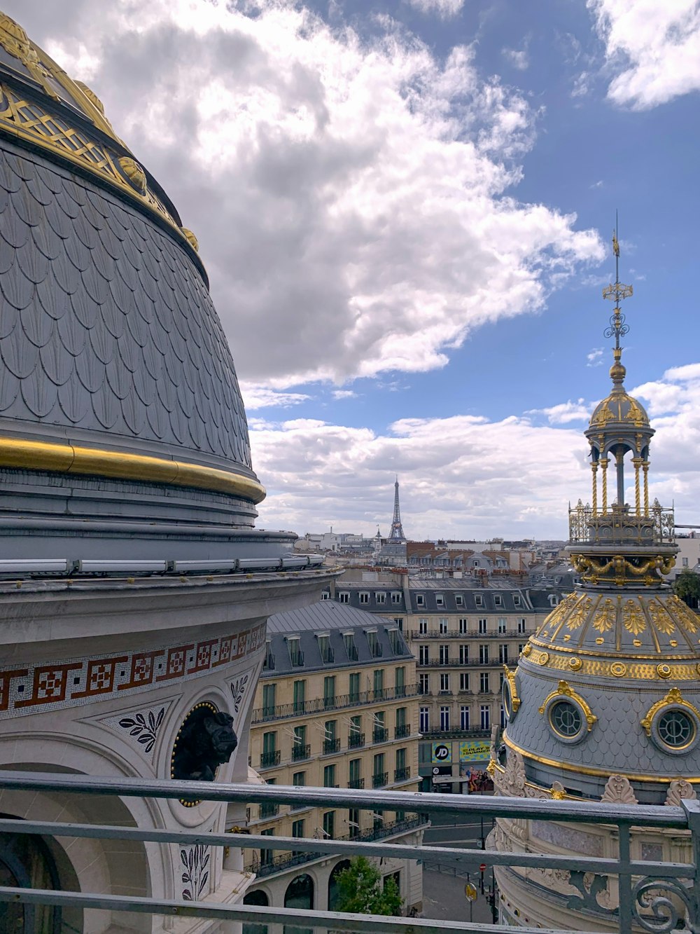 a view of a domed building from a balcony