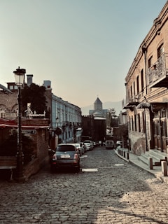 Historic cityscape with cobblestone streets and charming old buildings.