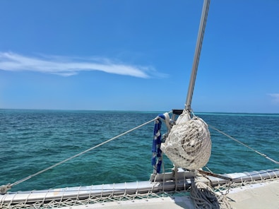a boat with a rope on the front of it
