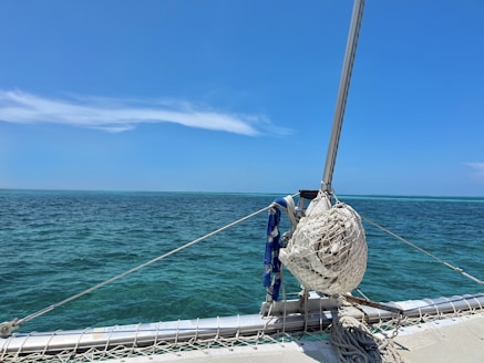 a boat with a rope on the front of it