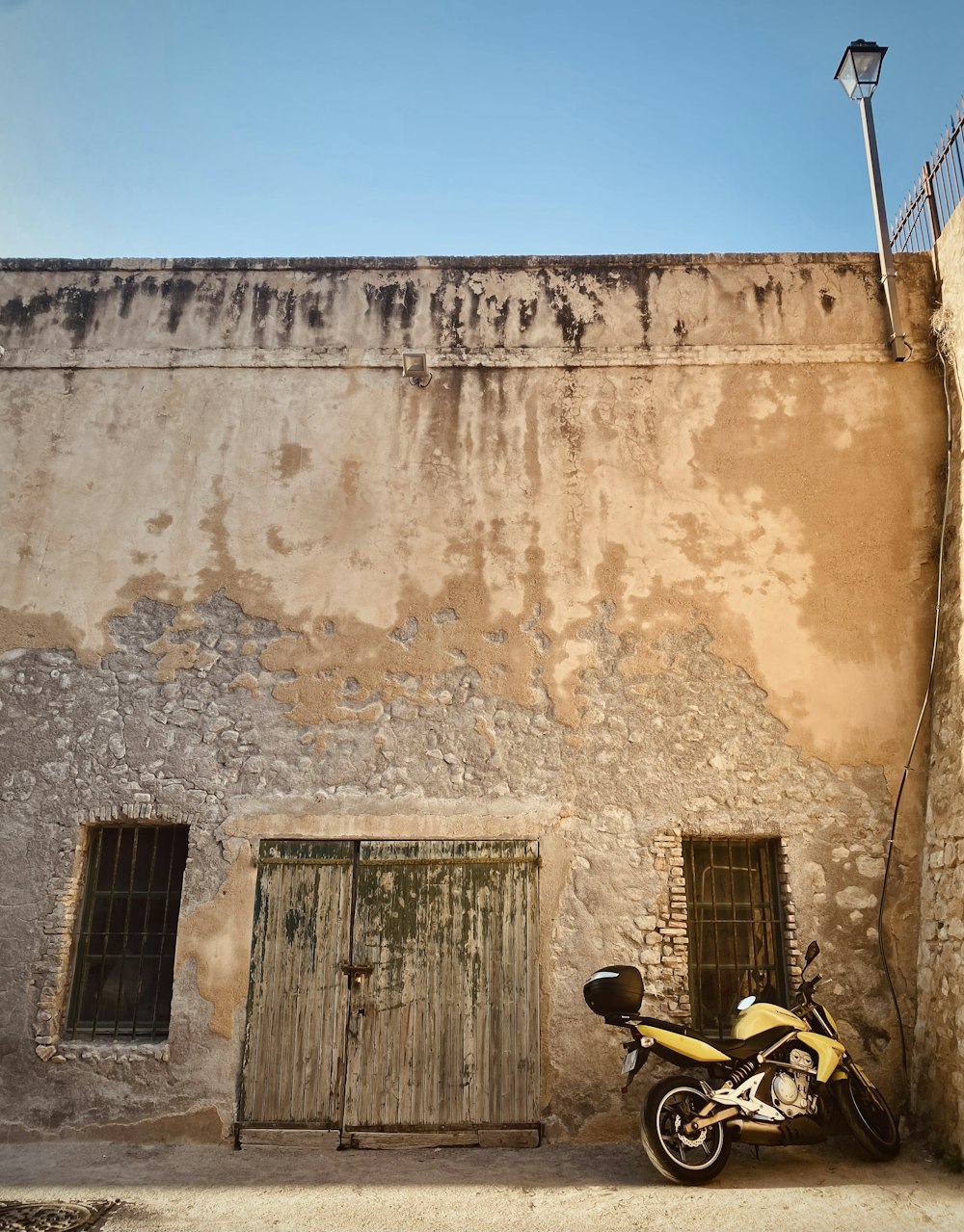 a motorcycle parked in front of a building