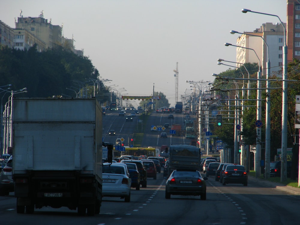 a city street filled with lots of traffic