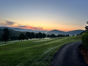A serene sunrise over the rolling hills of the Camino de Santiago trail.