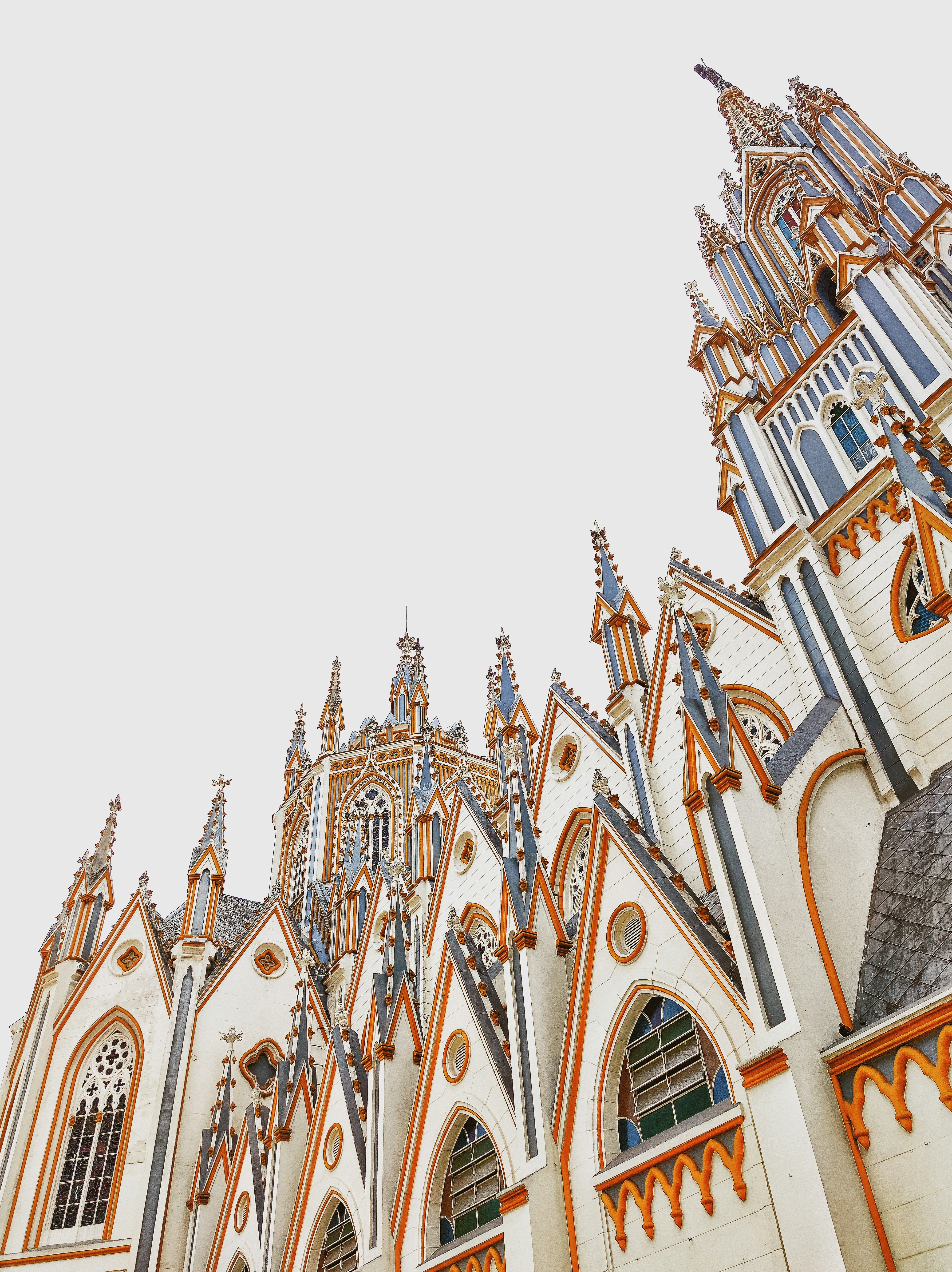 a very tall building with a clock on it's side