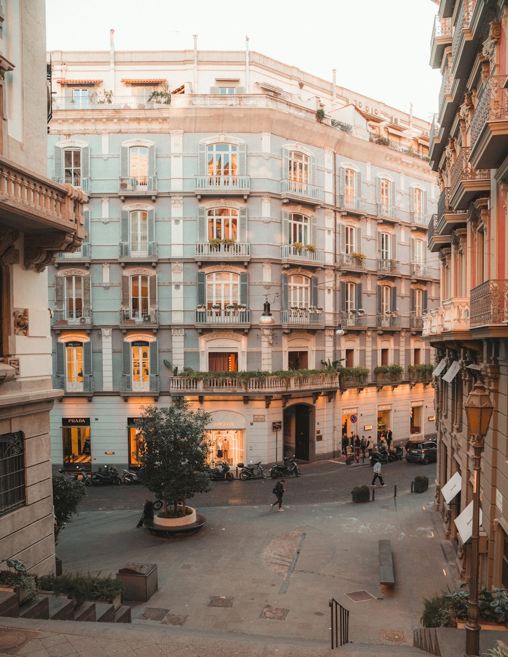 a city street filled with lots of tall buildings