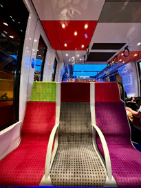Detailed shot of a modern train interior highlighting ergonomic design and advanced materials.