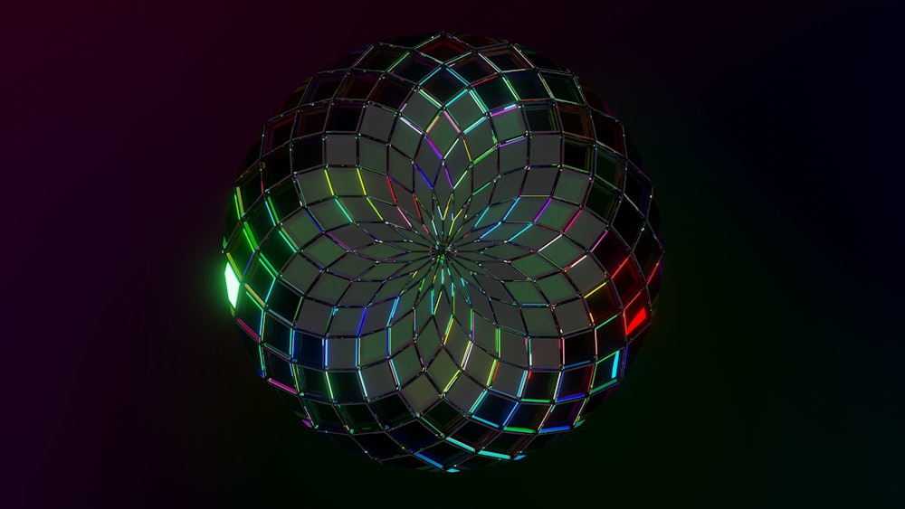 a colorful circular object with a black background