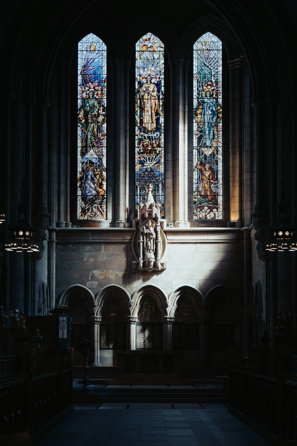 a large stained glass window in a church