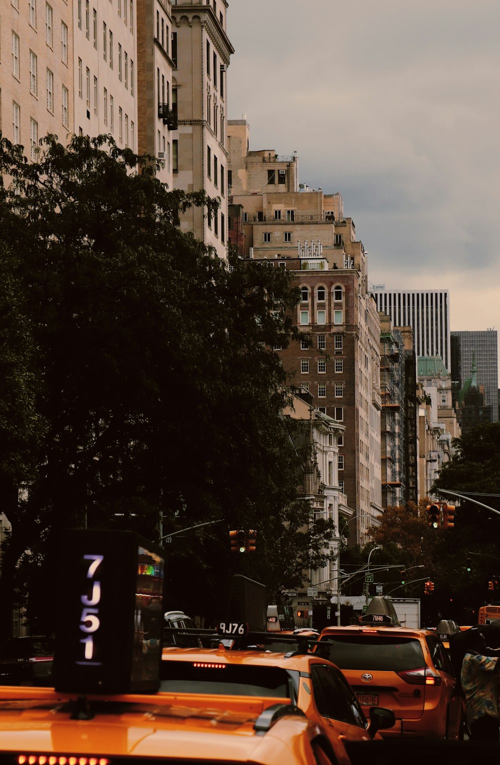 a city street filled with lots of tall buildings