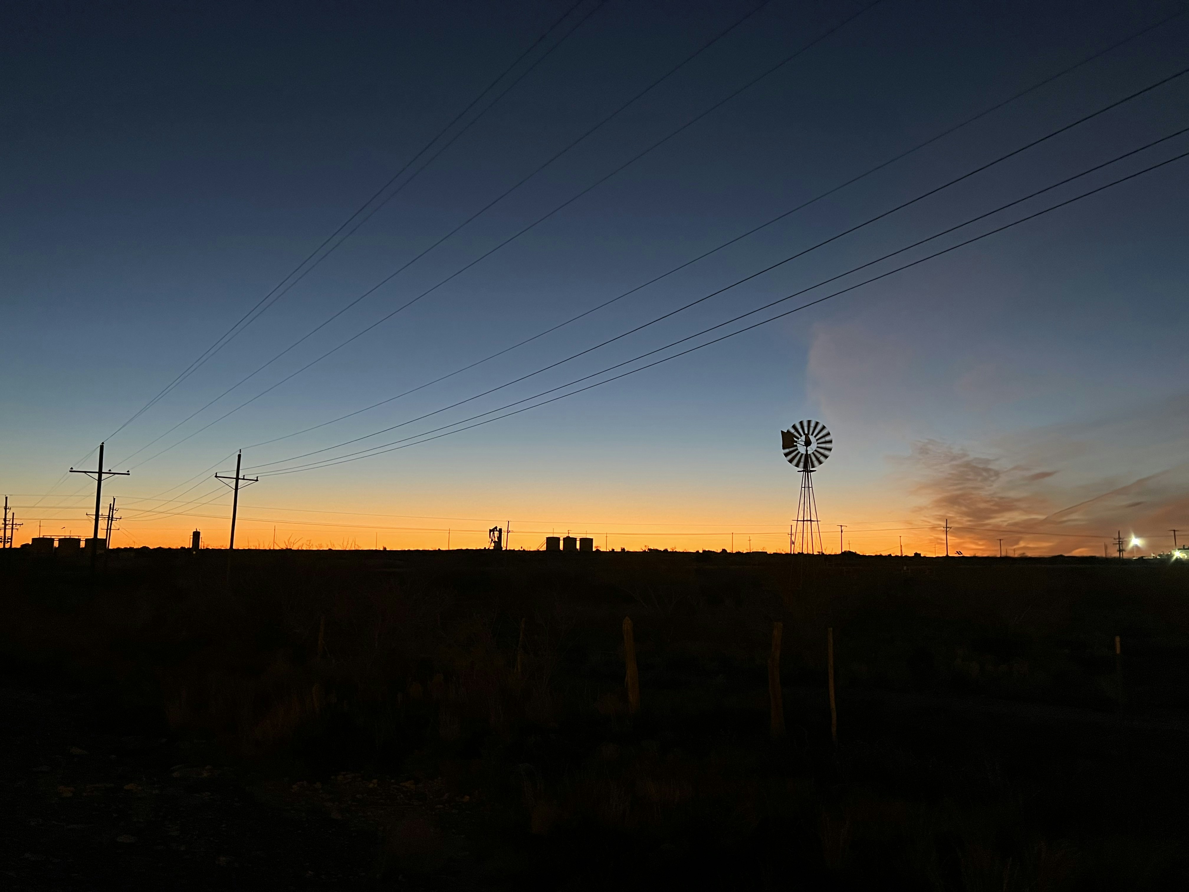 West Texas sunrise with windmill