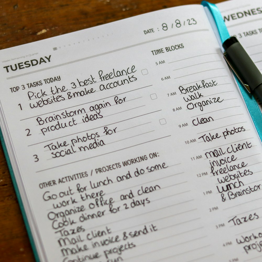 a recipe book with a pen on top of it