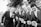 A group of men in suits enjoying a formal event together.