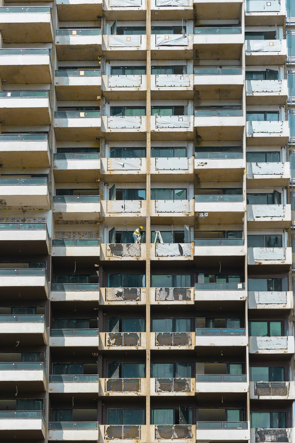 a tall building with balconies and balconies on it