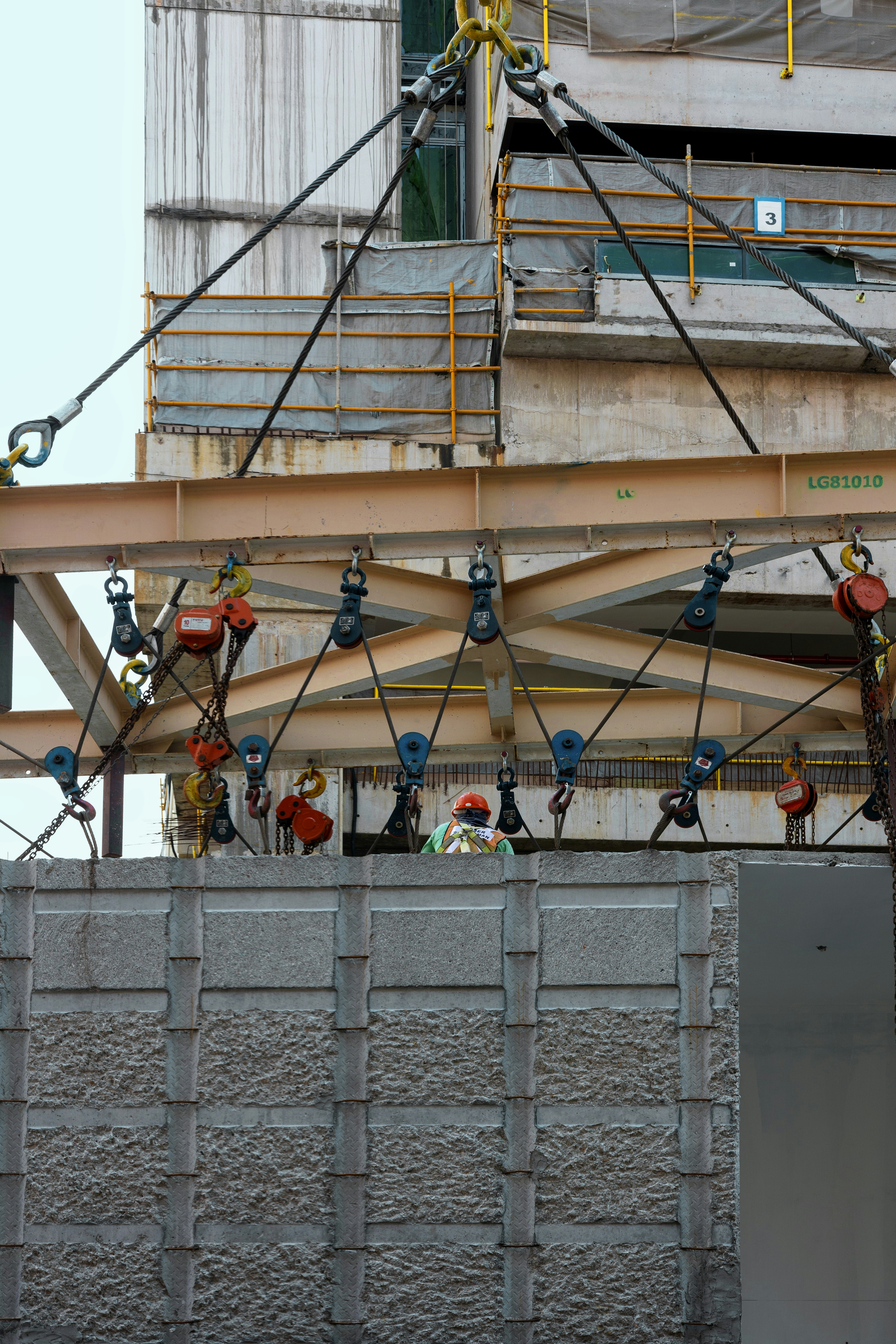 a crane is attached to the side of a building