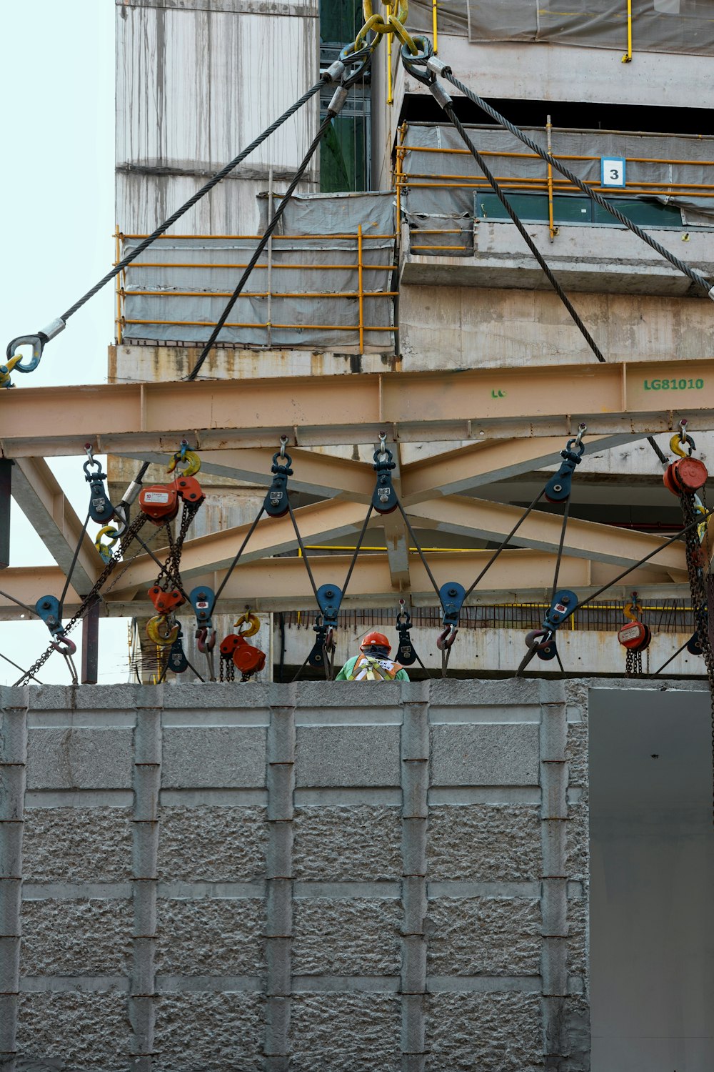 a crane is attached to the side of a building