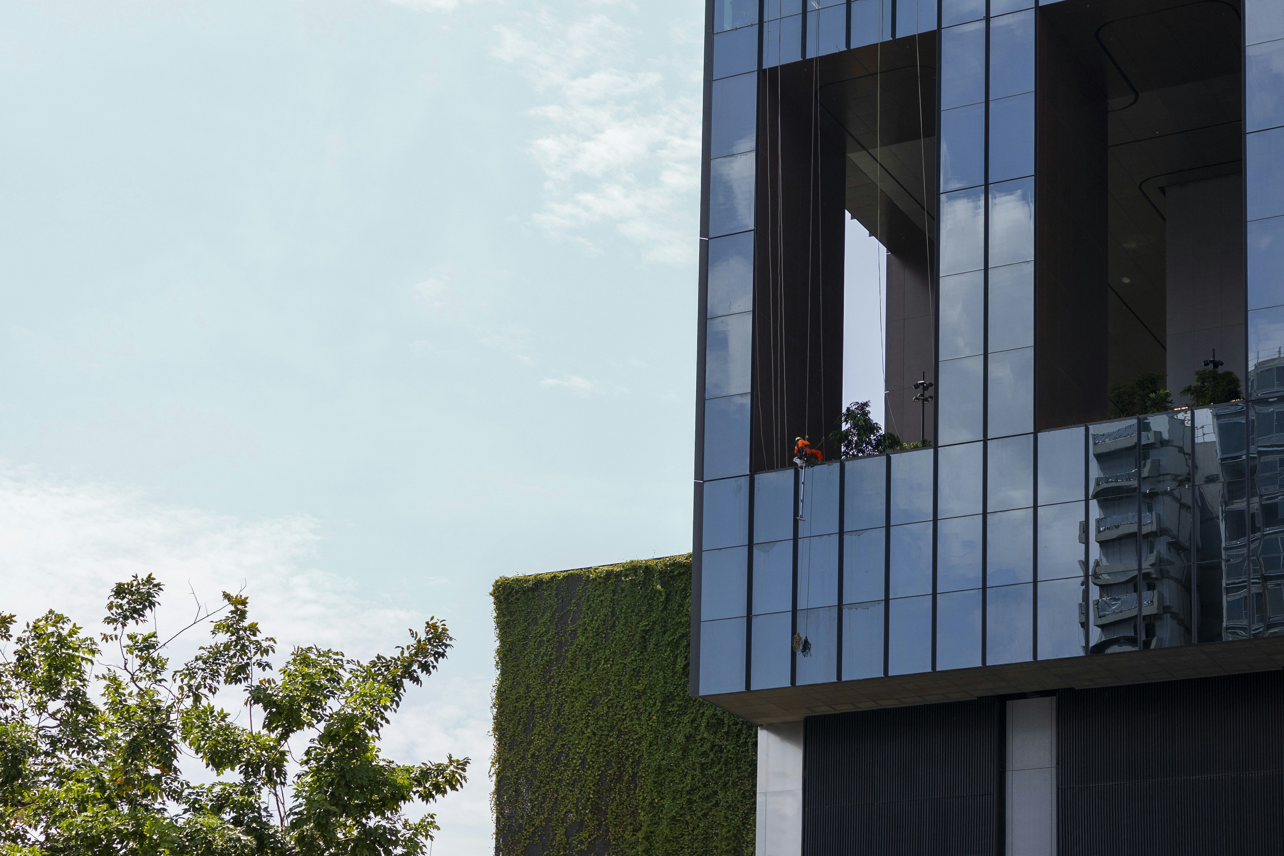a tall building with a clock on the side of it