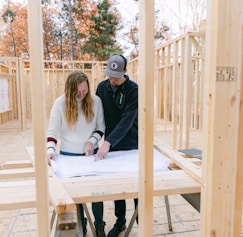 a man and a woman are sitting at a table