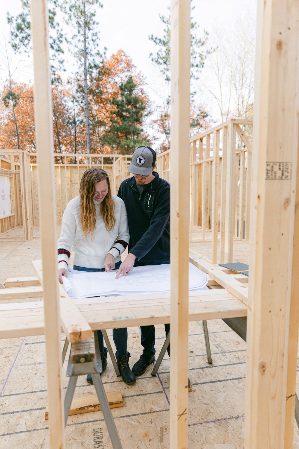 a man and a woman are sitting at a table